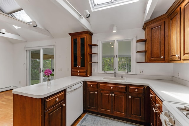 100 Potonumecot Rd, Chatham, MA 02633 - kitchen with white appliances, a skylight, open shelves, a sink, and vaulted ceiling