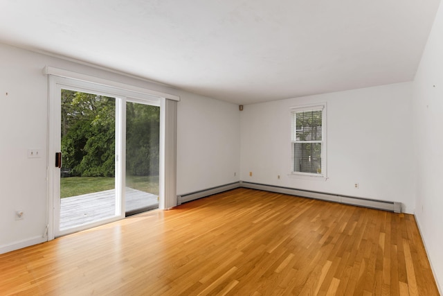 100 Potonumecot Rd, Chatham, MA 02633 - empty room with healthy amount of natural light and light wood-style floors