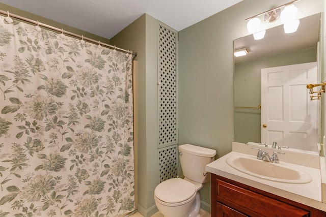 100 Potonumecot Rd, Chatham, MA 02633 - bathroom with vanity, toilet, and curtained shower