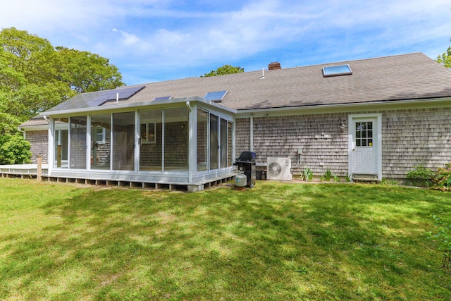 100 Potonumecot Rd, Chatham, MA 02633 - rear view of property featuring ac unit, a sunroom, a yard, and a chimney