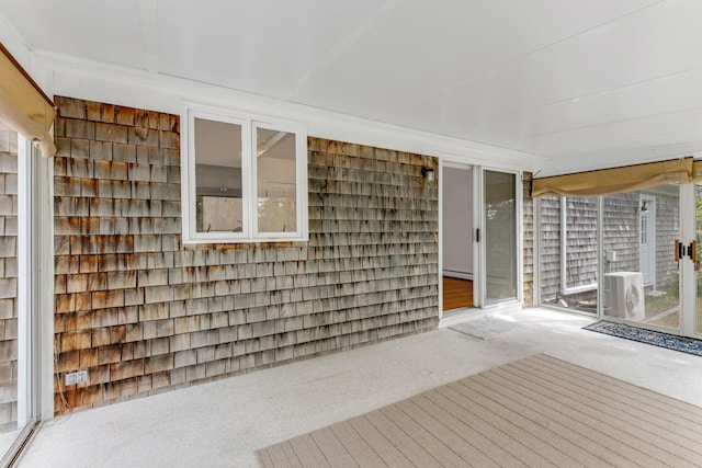 100 Potonumecot Rd, Chatham, MA 02633 - deck with a baseboard heating unit and a cooling unit