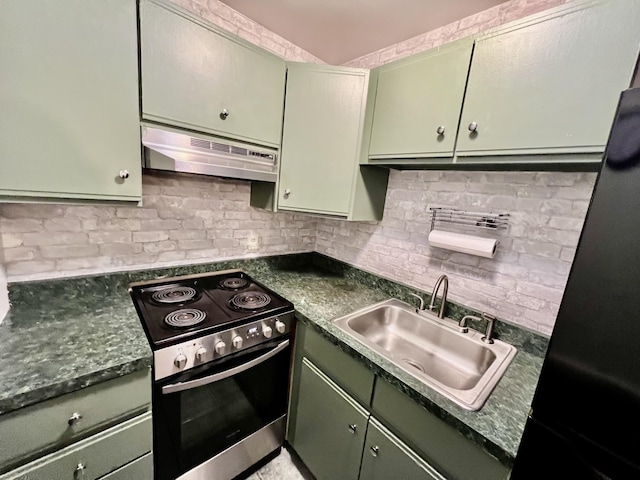 3 Winthrop St Unit U1, Provincetown, MA 02657 - kitchen with green cabinetry, stainless steel electric range, under cabinet range hood, a sink, and backsplash