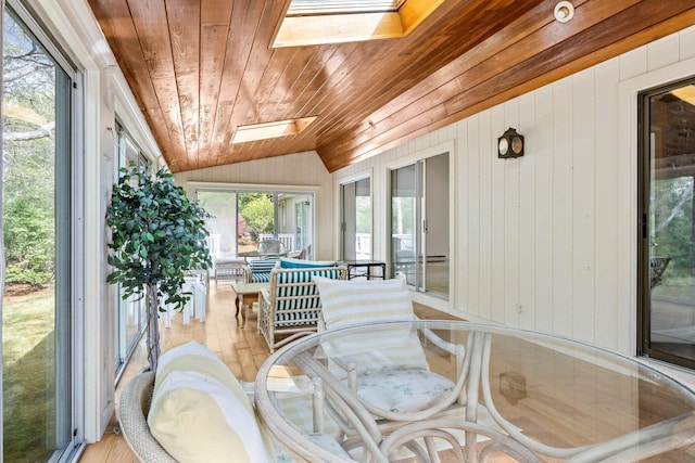 154 Cotuit Bay Dr, Cotuit, MA 02635 - sunroom featuring a skylight, wood ceiling, outdoor dining space, lofted ceiling, and wood walls