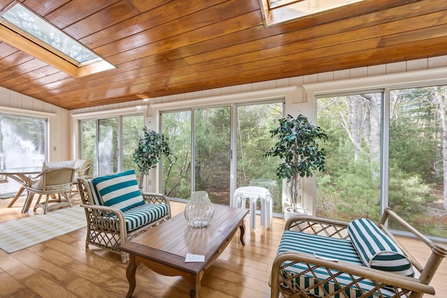 154 Cotuit Bay Dr, Cotuit, MA 02635 - sunroom / solarium with a skylight, wooden ceiling, hardwood / wood-style flooring, healthy amount of natural light, and vaulted ceiling