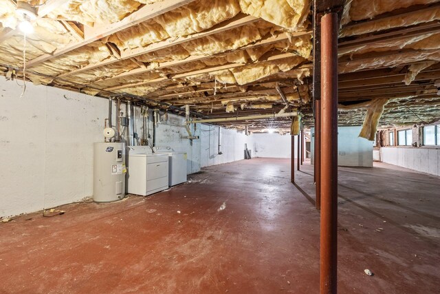 154 Cotuit Bay Dr, Cotuit, MA 02635 - basement featuring washing machine and clothes dryer and water heater