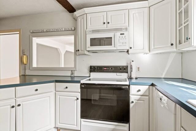 154 Cotuit Bay Dr, Cotuit, MA 02635 - kitchen featuring white appliances, white cabinetry, and dark countertops