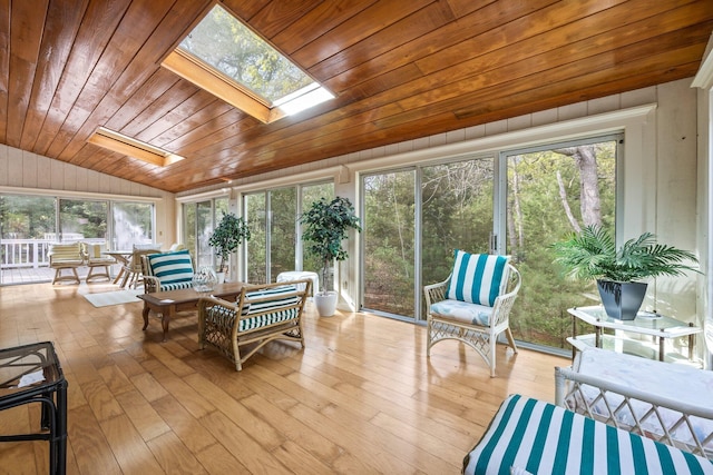 154 Cotuit Bay Dr, Cotuit, MA 02635 - sunroom with a skylight, vaulted ceiling, wood ceiling, healthy amount of natural light, and hardwood / wood-style floors