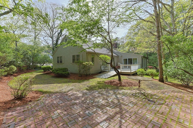 154 Cotuit Bay Dr, Cotuit, MA 02635 - view of front of house featuring a wooden deck