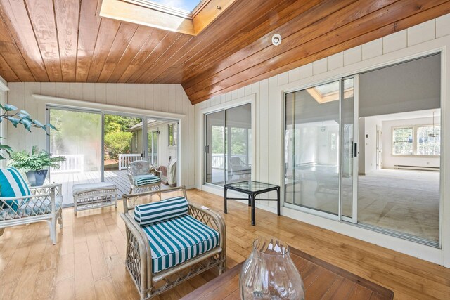 154 Cotuit Bay Dr, Cotuit, MA 02635 - sunroom with a skylight, lofted ceiling, wooden ceiling, outdoor lounge area, and baseboard heating