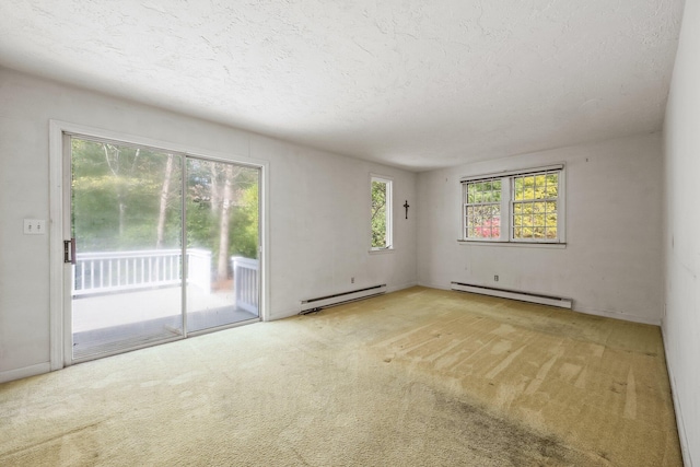 154 Cotuit Bay Dr, Cotuit, MA 02635 - carpeted empty room with a baseboard radiator and a textured ceiling
