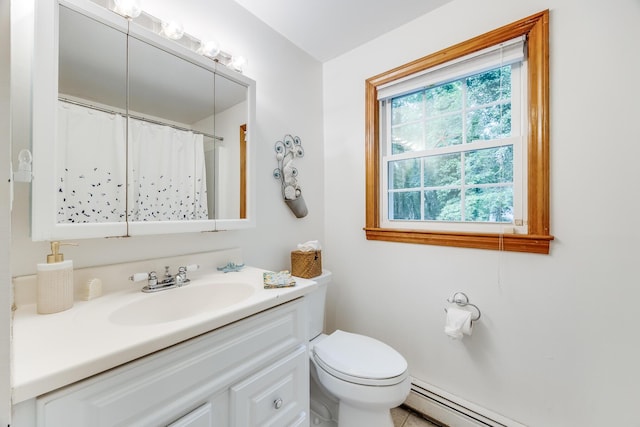7 Liberty Pl, East Dennis, MA 02641 - bathroom with a baseboard radiator, vanity, and toilet