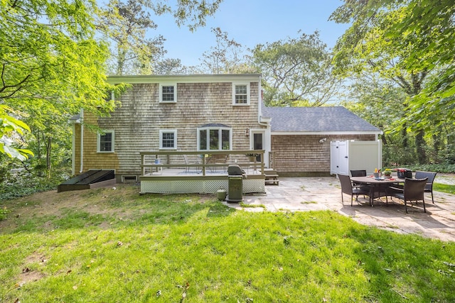 7 Liberty Pl, East Dennis, MA 02641 - rear view of house with a deck, a yard, and a patio area