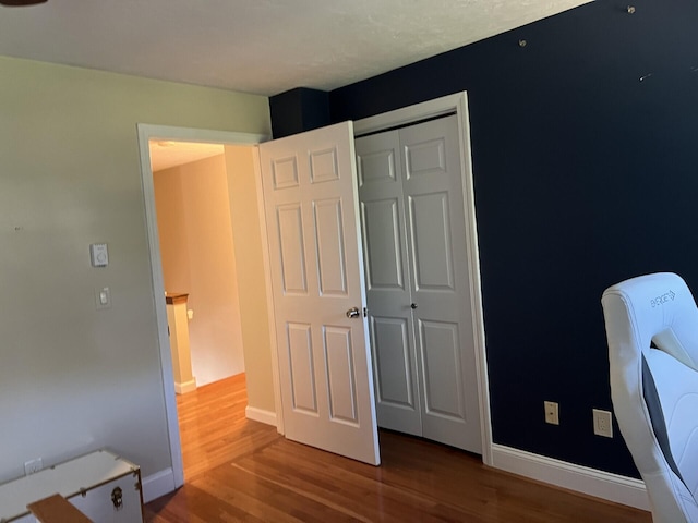 unfurnished office featuring hardwood / wood-style flooring