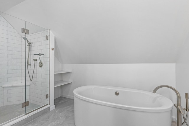 97 Great Western Rd, Harwich, MA 02645 - bathroom featuring marble finish floor, a freestanding tub, lofted ceiling, baseboards, and a stall shower