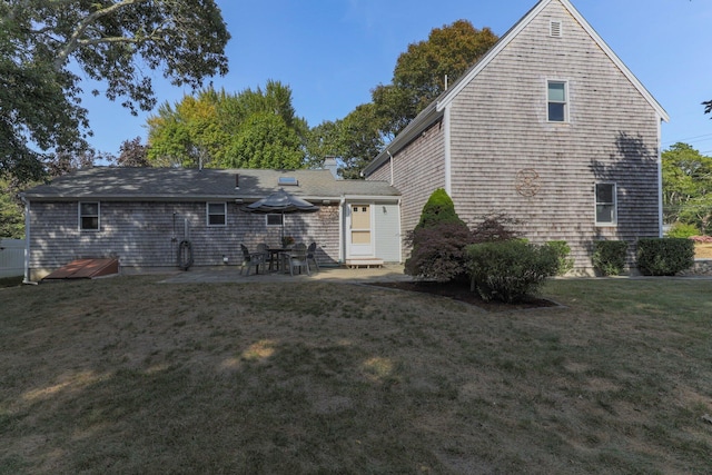 97 Great Western Rd, Harwich, MA 02645 - back of house featuring a yard and a patio area