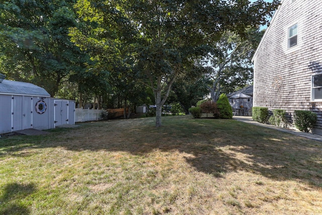 97 Great Western Rd, Harwich, MA 02645 - view of yard featuring fence, an outbuilding, and a shed