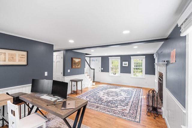 13 Old Fields Rd, Sandwich, MA 02563 - office featuring wainscoting, crown molding, light wood-style floors, a fireplace with flush hearth, and recessed lighting