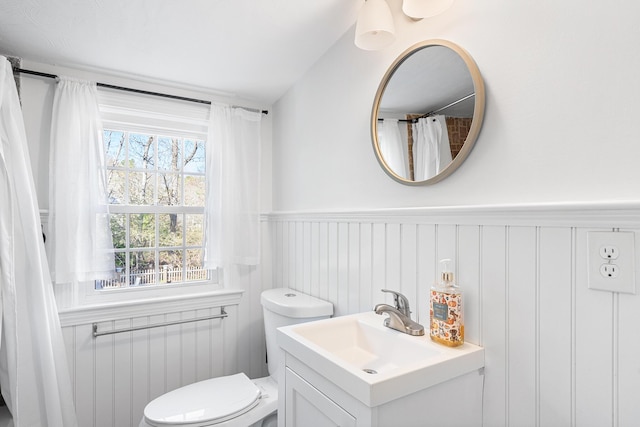 13 Old Fields Rd, Sandwich, MA 02563 - full bath with vanity, a wainscoted wall, and a decorative wall