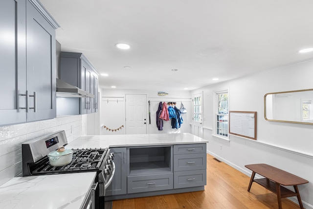 13 Old Fields Rd, Sandwich, MA 02563 - kitchen featuring gas range, gray cabinets, a peninsula, recessed lighting, and light wood-type flooring