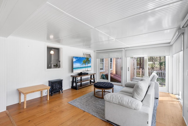 13 Old Fields Rd, Sandwich, MA 02563 - living area featuring a wood stove and light wood finished floors