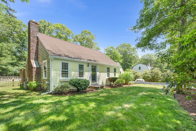 13 Old Fields Rd, Sandwich, MA 02563 - view of front of home featuring a chimney and roof with shingles