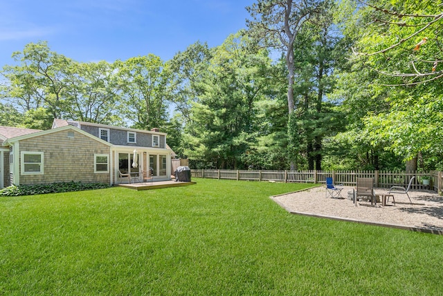 13 Old Fields Rd, Sandwich, MA 02563 - fenced backyard with a deck and a patio