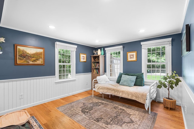 13 Old Fields Rd, Sandwich, MA 02563 - living area with plenty of natural light, ornamental molding, wainscoting, wood finished floors, and recessed lighting