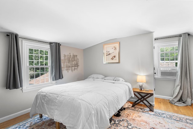 13 Old Fields Rd, Sandwich, MA 02563 - bedroom featuring wood finished floors, vaulted ceiling, and cooling unit
