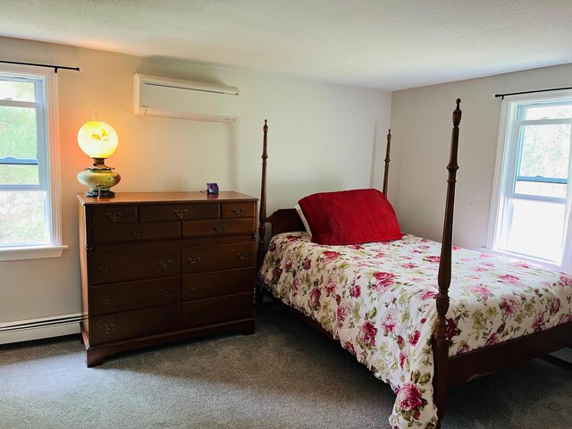 19 Artisan Way, Forestdale, MA 02644 - bedroom with a baseboard heating unit, carpet flooring, and a wall unit AC