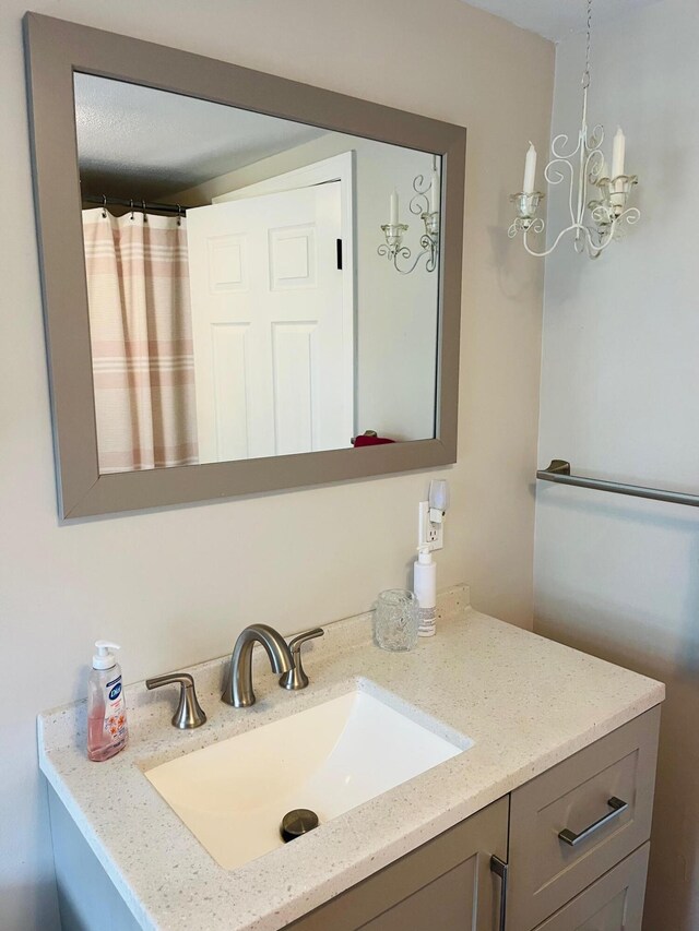 19 Artisan Way, Forestdale, MA 02644 - full bath with a chandelier and vanity