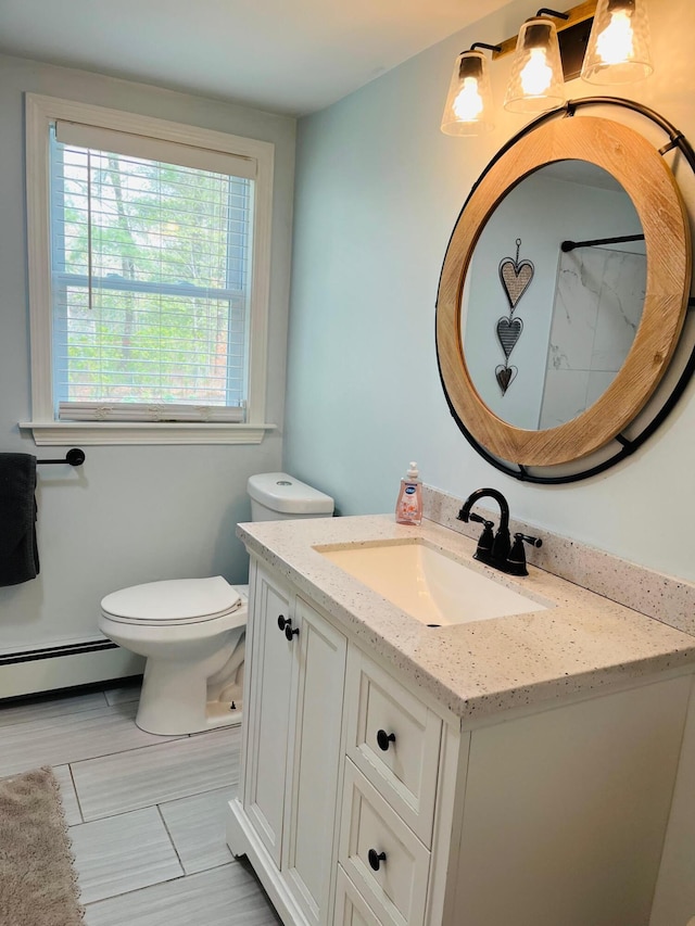 19 Artisan Way, Forestdale, MA 02644 - bathroom featuring toilet, baseboard heating, and vanity
