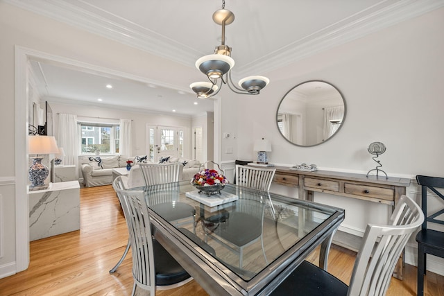 21 Priscilla Alden Rd Ua, Unit Ua, Provincetown, MA 02657 - dining area featuring light wood-type flooring, ornamental molding, a notable chandelier, and recessed lighting