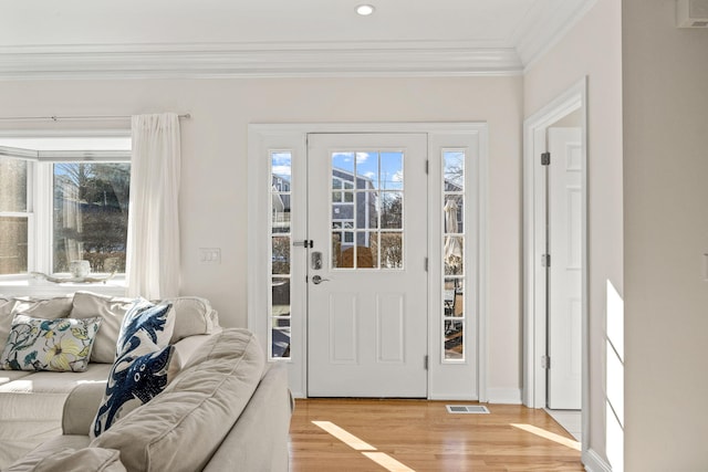 21 Priscilla Alden Rd Ua, Unit Ua, Provincetown, MA 02657 - entryway featuring light wood-type flooring, visible vents, crown molding, and recessed lighting