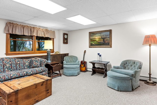 10 Bradford Ln, Eastham, MA 02642 - carpeted living room featuring a baseboard heating unit and a drop ceiling
