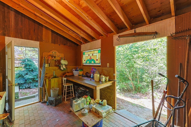 10 Bradford Ln, Eastham, MA 02642 - dining space with vaulted ceiling and wood walls