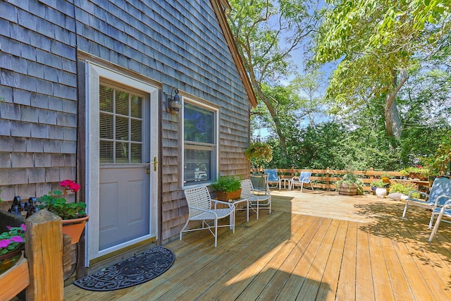 10 Bradford Ln, Eastham, MA 02642 - wooden terrace with outdoor dining space