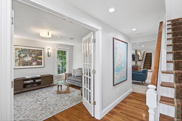 72 River Rd, Marstons Mills, MA 02648 - hall with stairway, wood finished floors, and recessed lighting