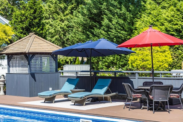 72 River Rd, Marstons Mills, MA 02648 - view of swimming pool with a wooden deck and outdoor dining space