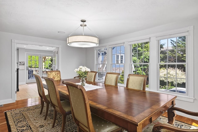72 River Rd, Marstons Mills, MA 02648 - dining space with plenty of natural light and light wood finished floors