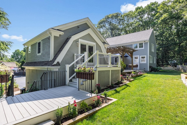 72 River Rd, Marstons Mills, MA 02648 - back of house with a pergola, a deck, a lawn, and stucco siding
