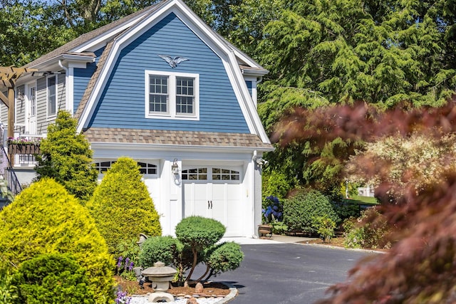 72 River Rd, Marstons Mills, MA 02648 - view of front of property featuring a gambrel roof and roof with shingles