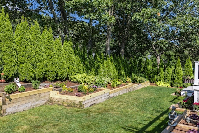 72 River Rd, Marstons Mills, MA 02648 - view of green lawn featuring a garden
