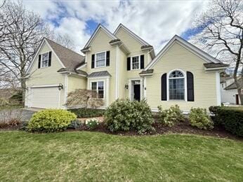 53 White Cliff Dr, Cedarville, MA 02360 - traditional home featuring a garage and a front lawn