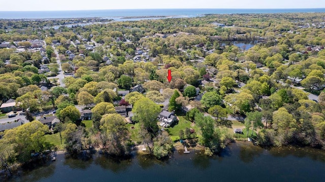 aerial view of property's location featuring a large body of water