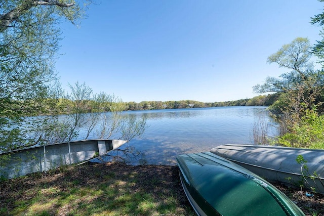 dock area featuring a water view