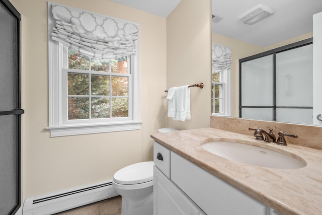 bathroom with vanity, a baseboard heating unit, an enclosed shower, and toilet