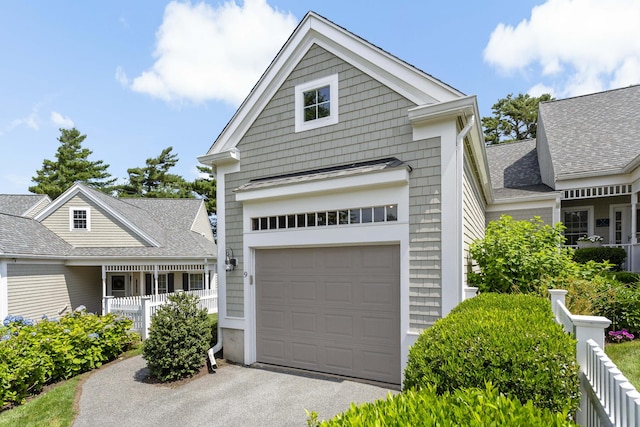 9 Sea Knoll Ct, Bourne, MA 02532 - view of front facade featuring a garage and driveway