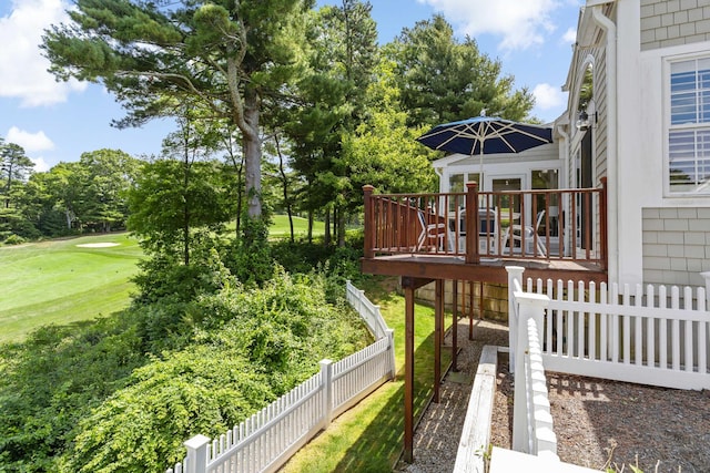 9 Sea Knoll Ct, Bourne, MA 02532 - view of yard featuring a wooden deck, golf course view, and view of scattered trees