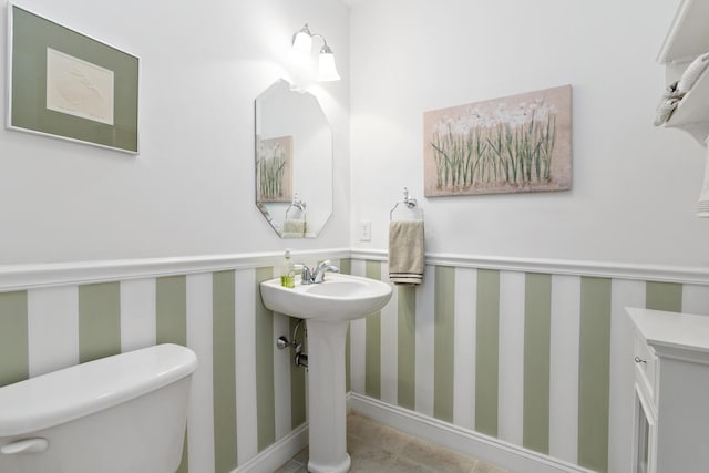 9 Sea Knoll Ct, Bourne, MA 02532 - half bath featuring toilet and tile patterned flooring