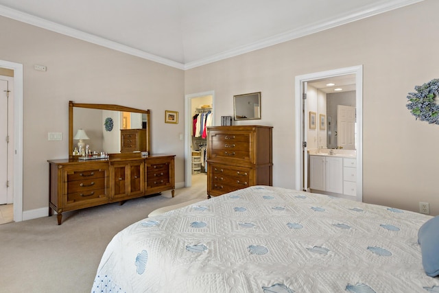 9 Sea Knoll Ct, Bourne, MA 02532 - bedroom with a spacious closet, light carpet, crown molding, and ensuite bathroom